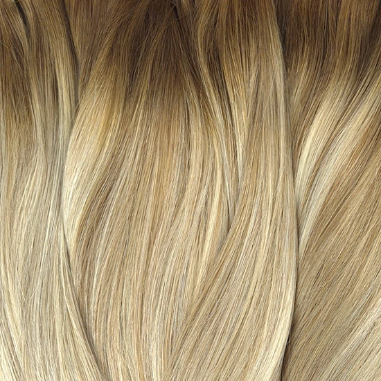Rooted Honey blonde balayage clip-in hair extensions zijn gemaakt van Remy human hair.