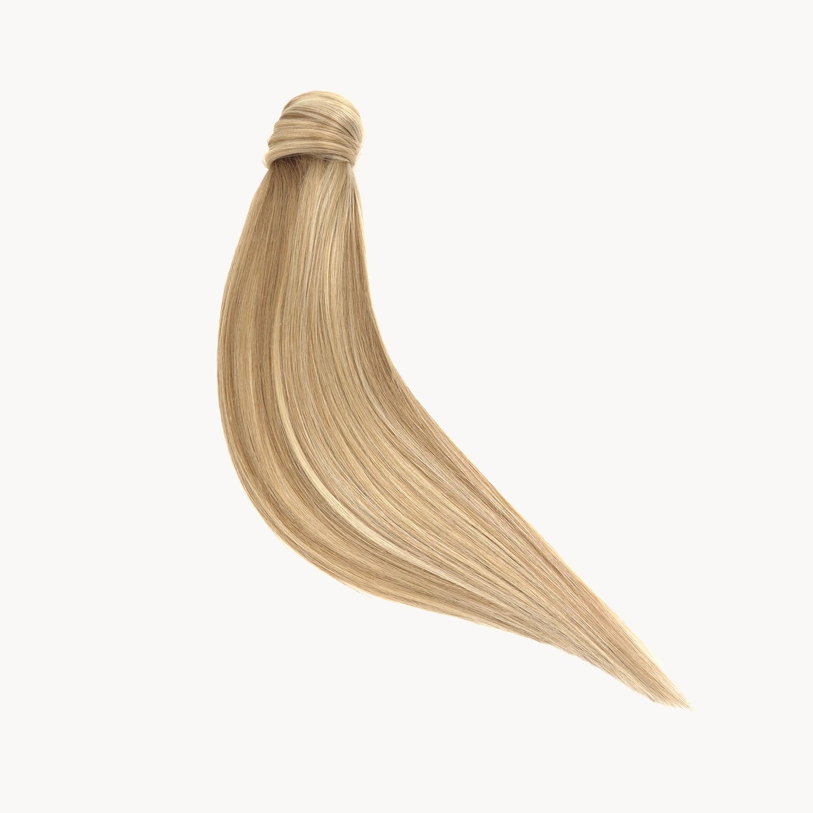 Remy human hair ponytail in de kleur licht blonde highlights. Een paardenstaart gemaakt van echt haar die je zo kan inclippen.