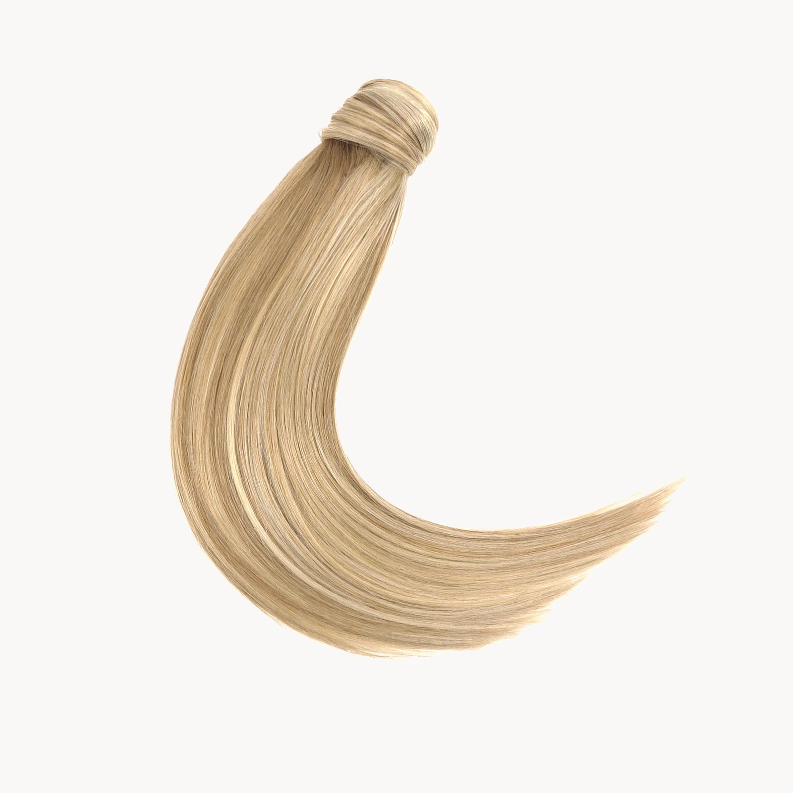 Paardenstaart van echt haar in het blond met highlights. Gemaakt van echt haar dus je kan het gewoon krullen en wassen.