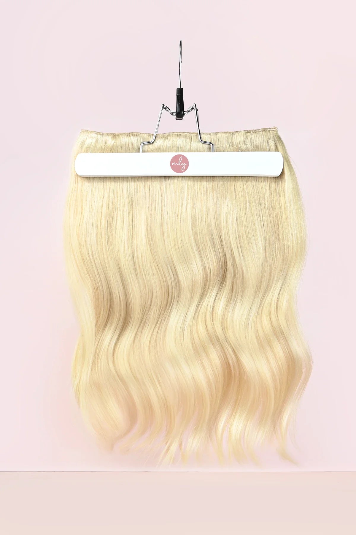 Platina blonde remy human hair clip in hairextensions gemaakt van echt haar. Double drawn dus vol tot in de punten.