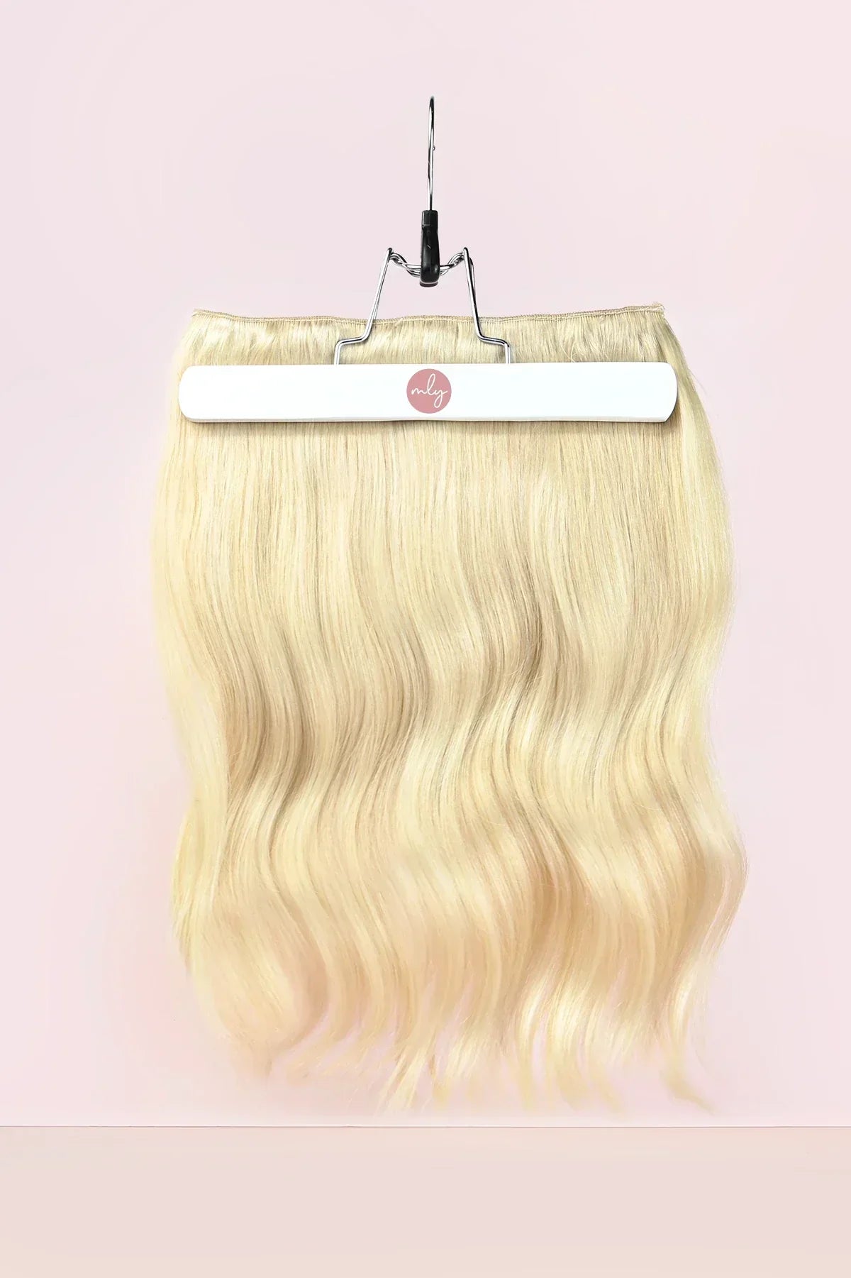 Platina blonde remy human hair clip in hairextensions gemaakt van echt haar. Double drawn dus vol tot in de punten.