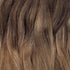 Clip in extensions van echt haar met overloop van bruin naar blond. Balayage en ombre tinten clip in hairextensions.