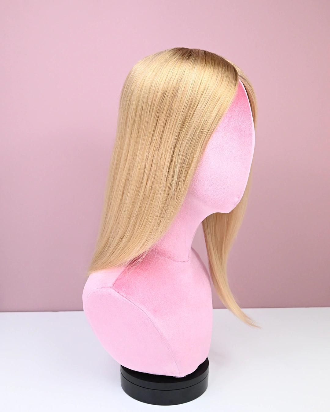 midden blonde haar topper van echt haar op een silk base voor de meest natuurlijke look. 
