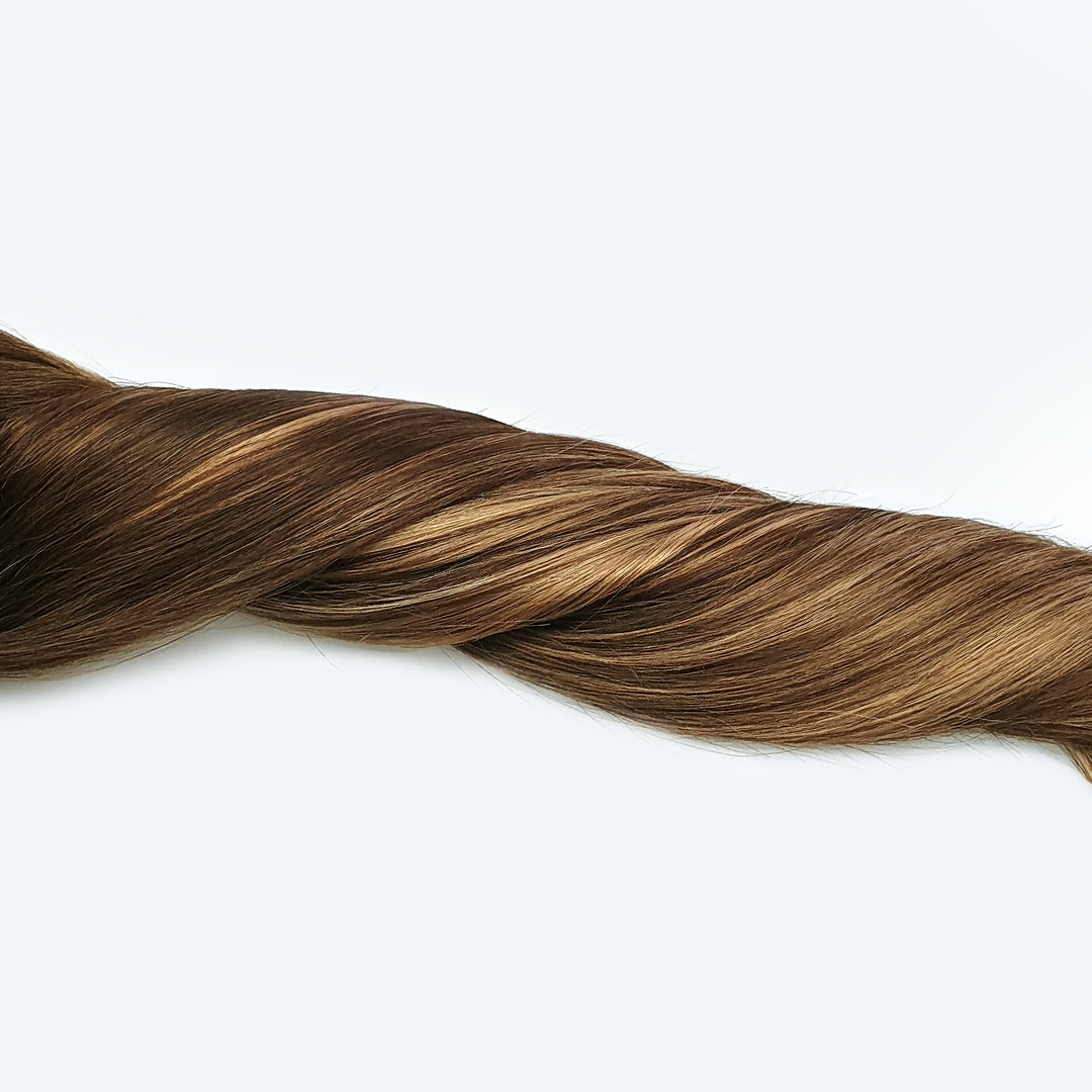 Clip in hairextensions met bruine uitgroei en blonde highlights. Bronde Balayage clip in hair.