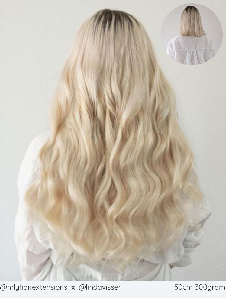 Clip-in-hairextensions platina blonde verlenging van kort naar lang haar. 50cm / 20inch lange haarverlenging licht blond.