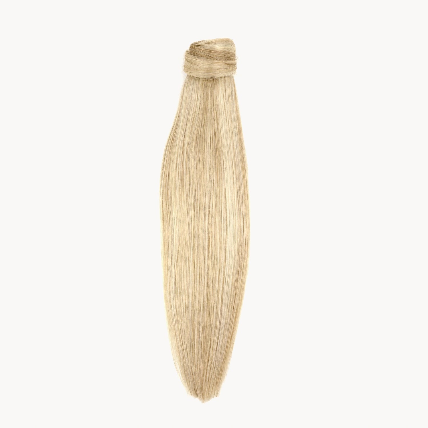 Natural blonde ponytail met subtiele highlights, voor een sunkissed look. Remy human hair dus ook te krullen. 