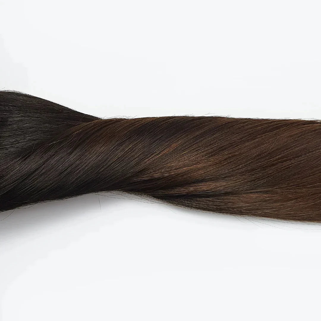 Zwart naar bruine clip in extensions. Natural black to brown hairextensions met clips.