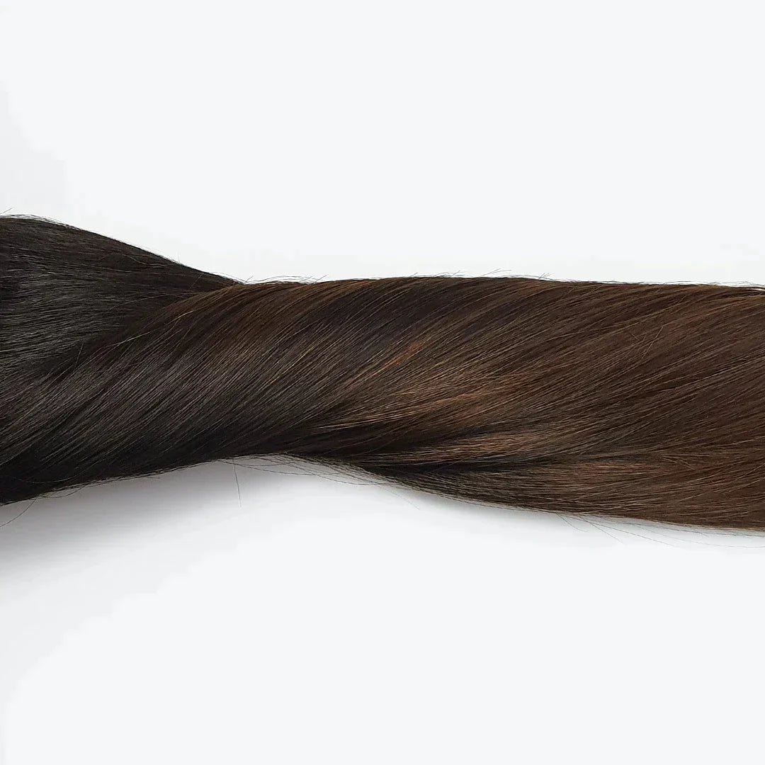 Zwart naar bruine clip in extensions. Natural black to brown hairextensions met clips.
