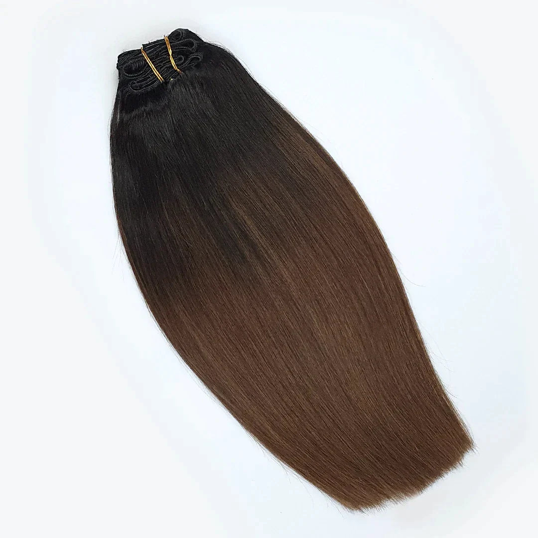 Zwart bruine naar chocolade bruine hairextensions. Balayage clip in extensions van echt haar.