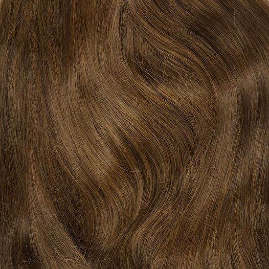 Warm Bruine clip in hairextensions van echt haar. Remy human hair clip ins in een warme midden bruin tint. 40 centimeter lange set circa 16inch hairextensions clip ins.