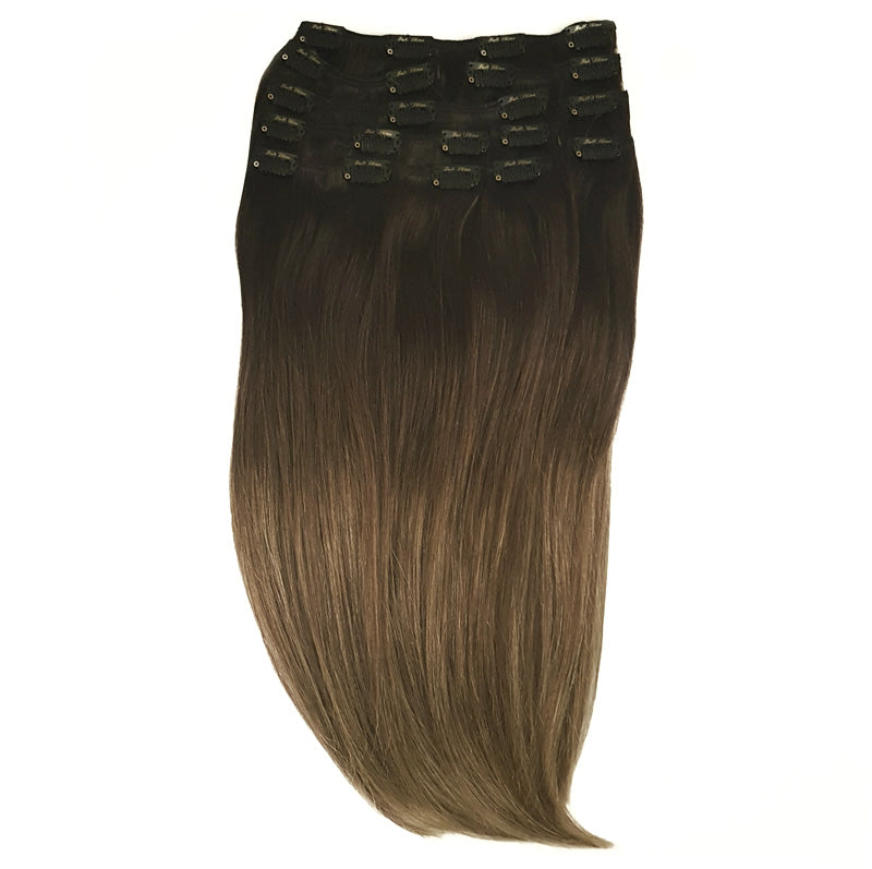 Full head set clip in hair met 8 stroken om te verdelen voor een complete verlenging zonder kapper. Ombre tinten van donker naar licht, zwart-bruin naar blond en bruintinten.