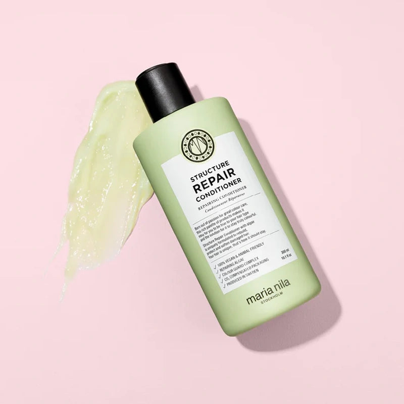 Maria Nila Structure Repair Conditioner is een 100% natuurlijk ontwarrende conditioner voor beschadigd, droog en chemisch behandeld haar. zoals hair extensions