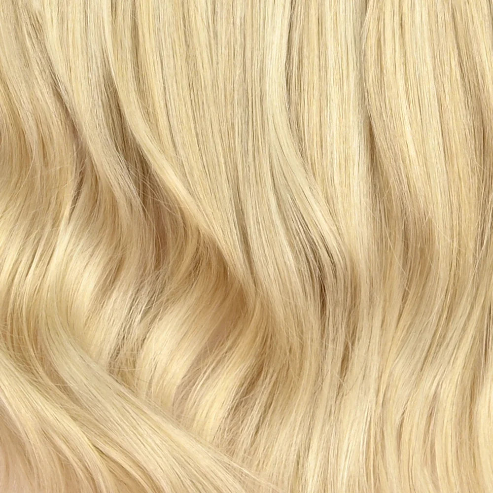 Een sunkissed natural blonde set met subtiele highlights (