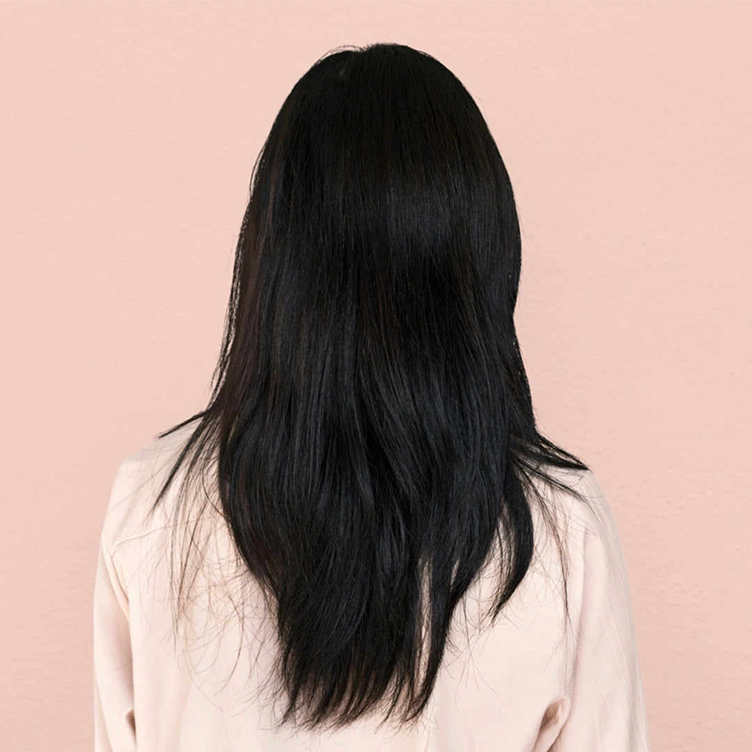 Remy human hair haar topper met clipjes voor een vollere kruin en het verbergen van kalende plekken.