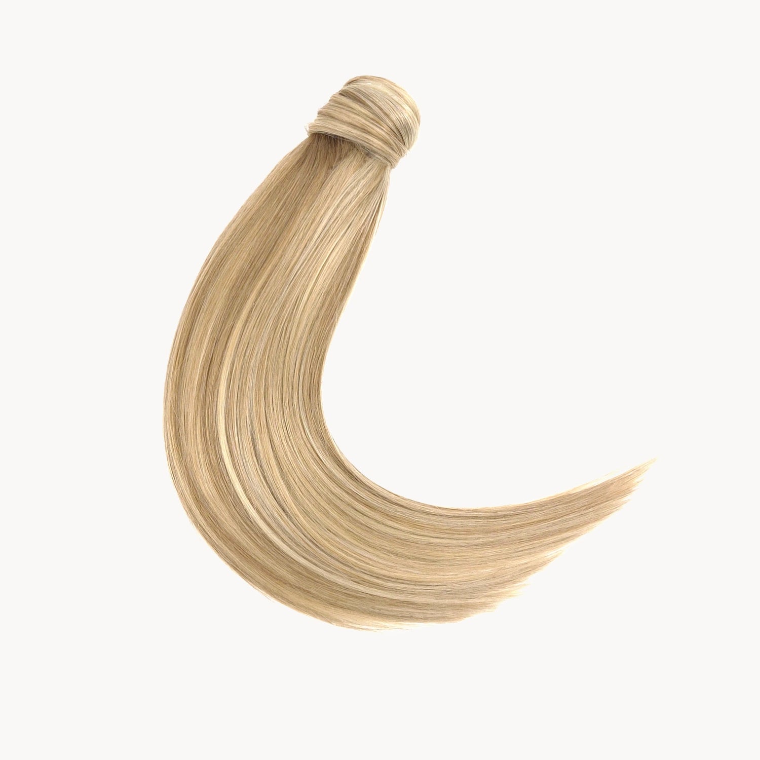 Paardenstaart van echt haar in het blond met highlights. Gemaakt van echt haar dus je kan het gewoon krullen en wassen. 
