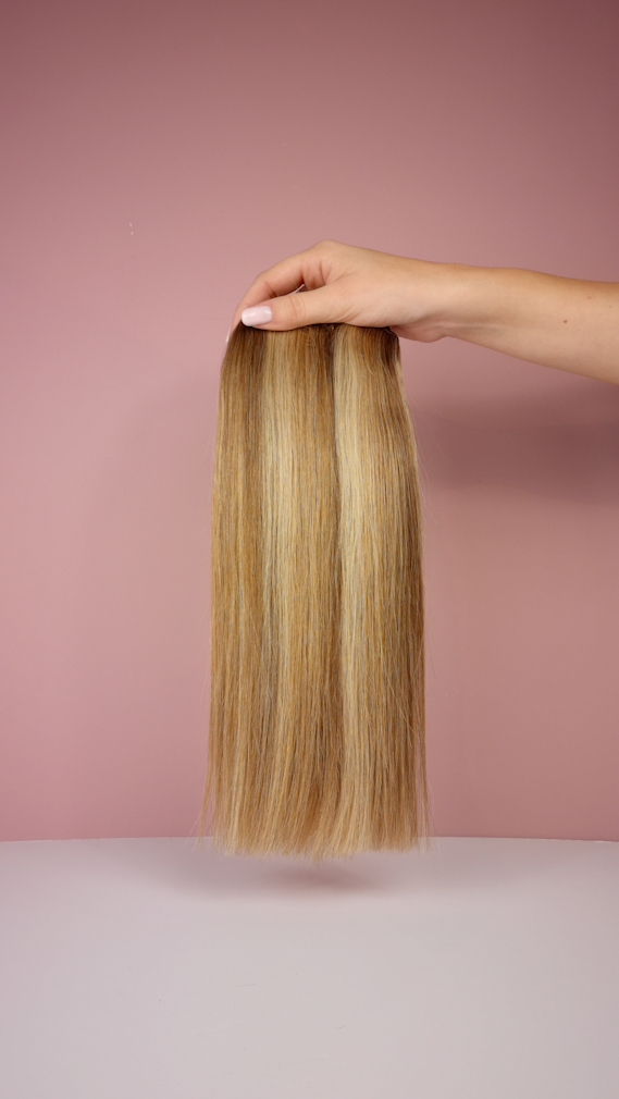 Video van de Mixed blonde clip-in Hairextensions. 40cm lange hairextensions van 180gram met verschillende blondtinten. 