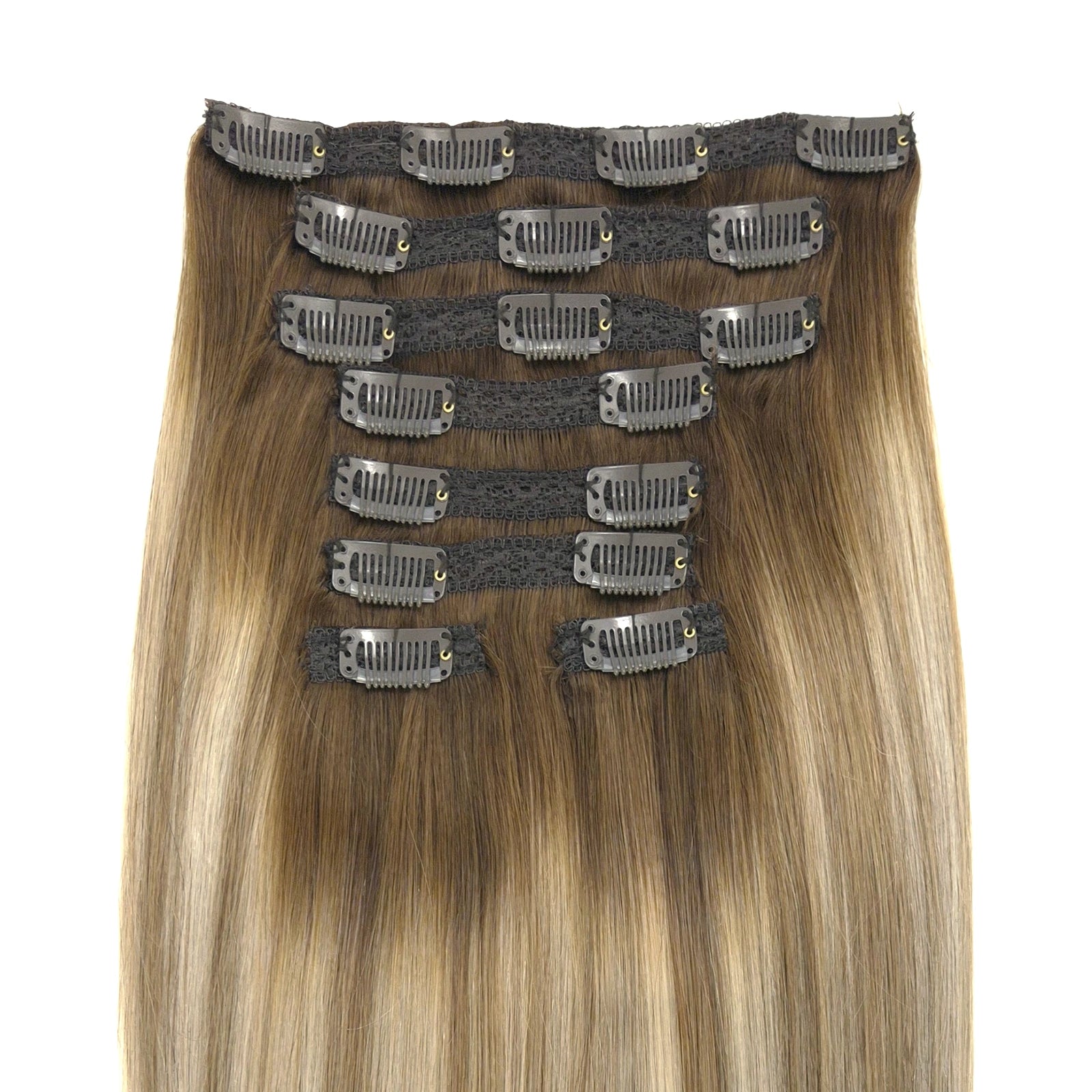 Set clip-in hair extensions met 9 baantjes van echt haar in de kleur Rooted Honey Blonde Balayage. Remy human hair, double drawn en dus vol tot in de punten. 