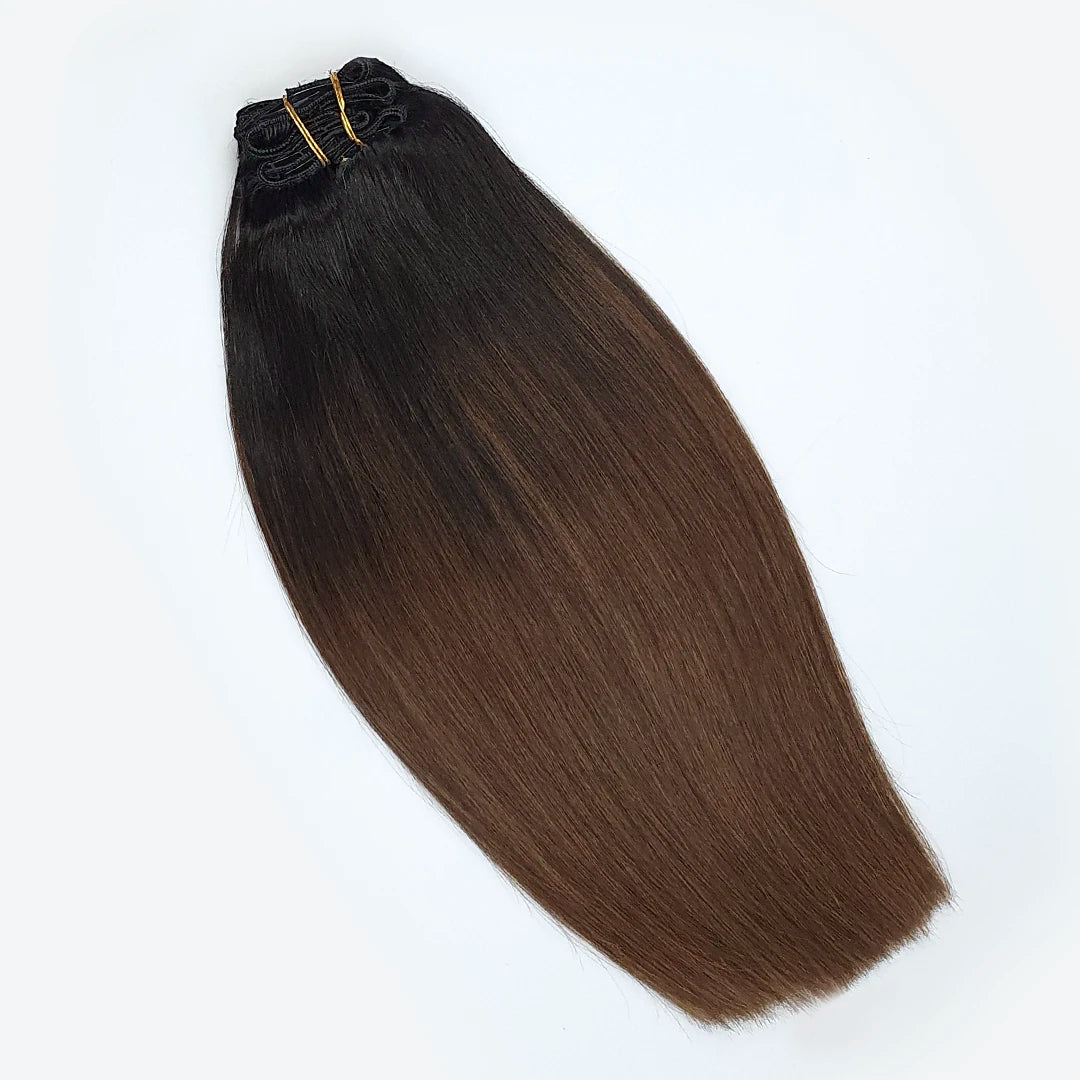 Zwart bruine naar chocolade bruine hairextensions. Balayage clip in extensions van echt haar.