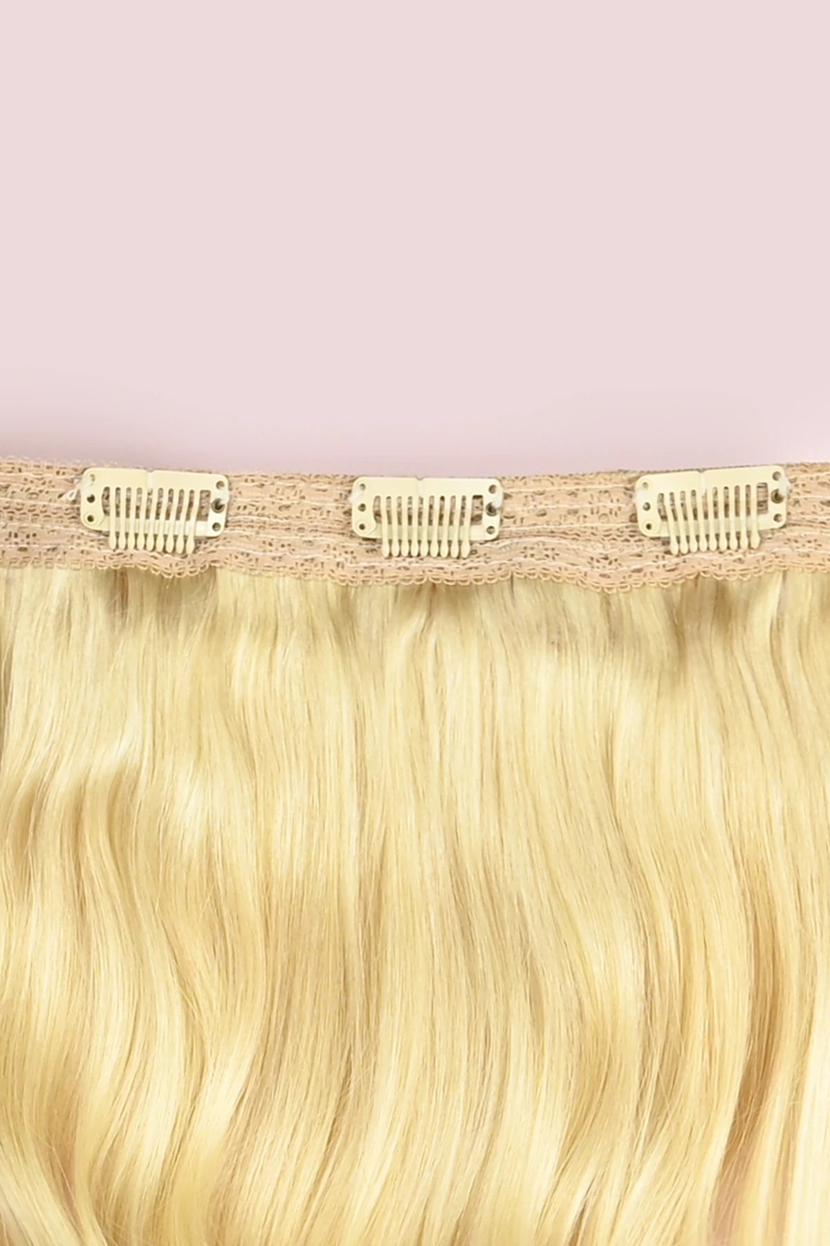 Close up van de clips van een 1 baans volumizer van remy indian human hair. 