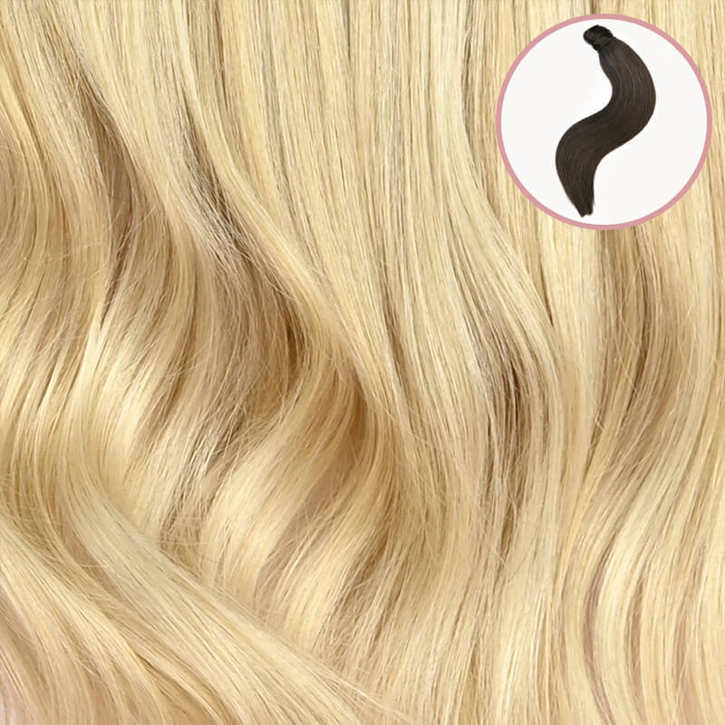 Natural blonde clip in ponytail van echt haar. Remy human hair paardenstaart extension