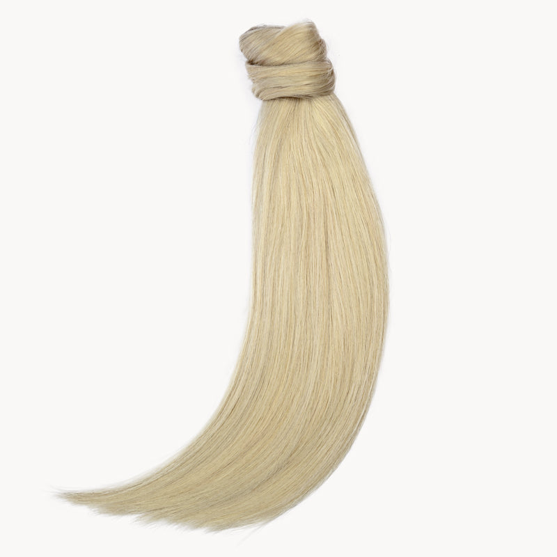 Platina blonde ponytail van echt haar. Remy human hair paardenstaart extension