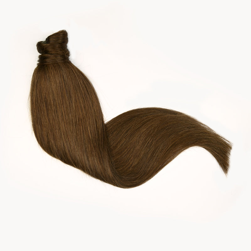 Warm bruine clip in ponytail van echt haar. Remy human hair paardenstaart extension